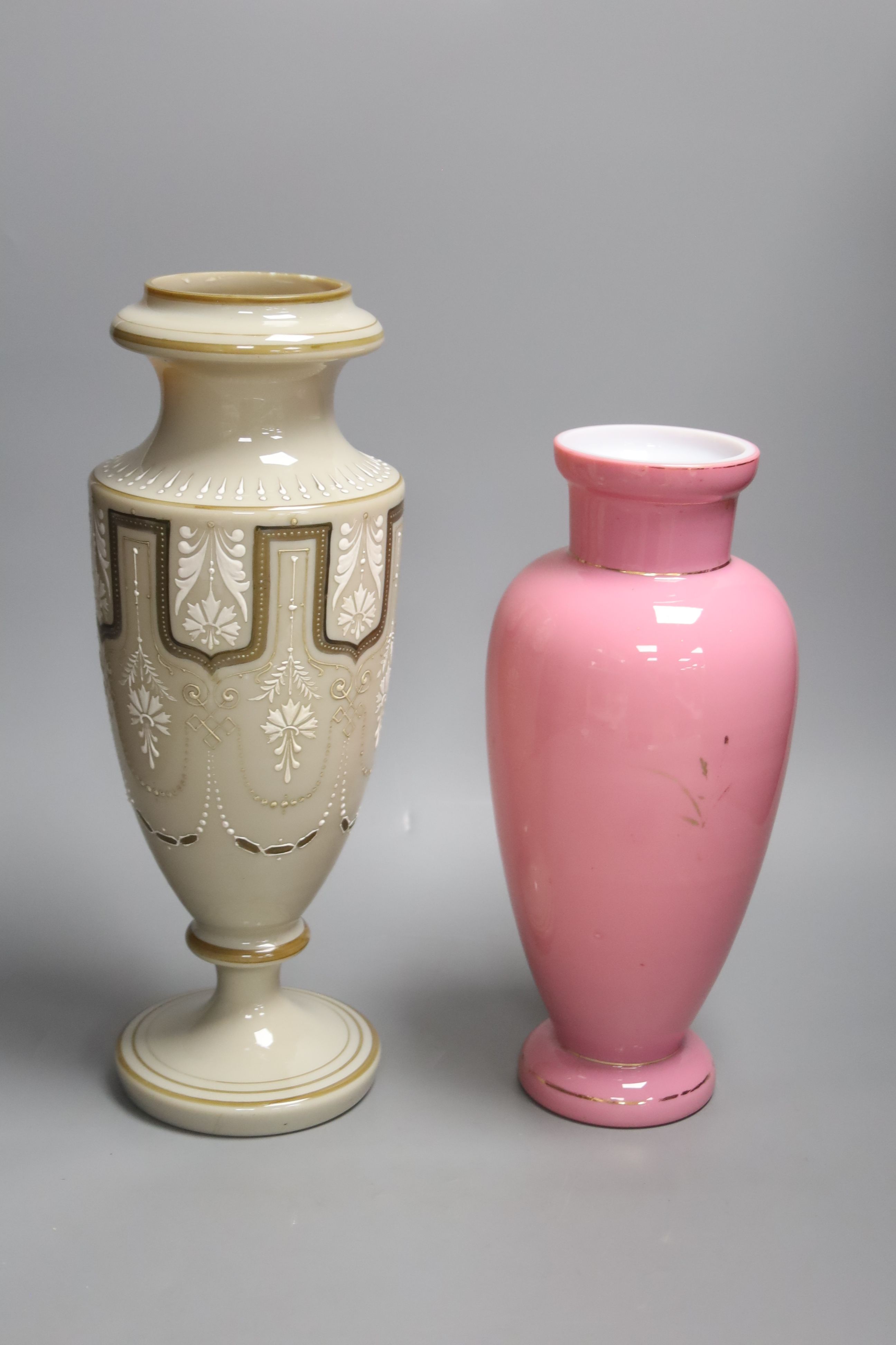 Two 19th century French enamelled glass vases, tallest 38cm